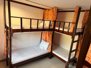 a group of bunk beds in a room at Malapascua Starlight Resort in Malapascua Island