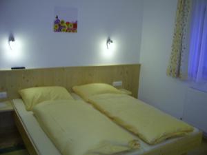 Postel nebo postele na pokoji v ubytování Ferienhaus Marian