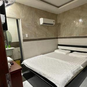 Postel nebo postele na pokoji v ubytování Le Lai Hotel