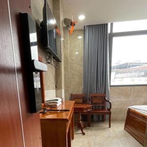 TV a/nebo společenská místnost v ubytování Le Lai Hotel