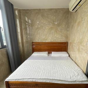 Postel nebo postele na pokoji v ubytování Le Lai Hotel