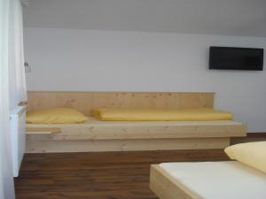 TV a/nebo společenská místnost v ubytování Ferienhaus Marian