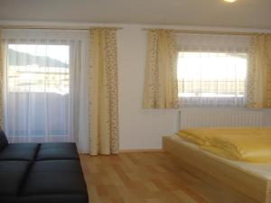 Postel nebo postele na pokoji v ubytování Ferienhaus Marian