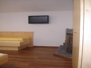 TV a/nebo společenská místnost v ubytování Ferienhaus Marian + 27 fotografií