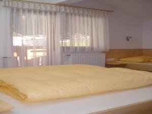 Postel nebo postele na pokoji v ubytování Ferienhaus Marian