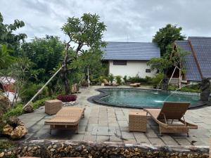 Bazén v ubytování Ringsun Homestay Uluwatu nebo v jeho okolí