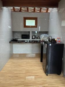 Kuchyň nebo kuchyňský kout v ubytování Ringsun Homestay Uluwatu
