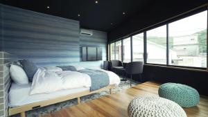 Кът за сядане в 1 and Only Hotel Io - イオ