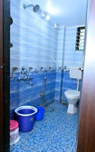 Koupelna v ubytování Sneh Beach Homestay - Wayangani Vengurla