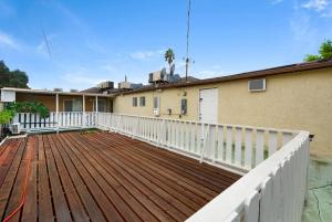 a deck in front of a house at Newly Renovated Home Spacious Close 2 Hospital in San Bernardino
