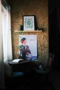TV a/nebo společenská místnost v ubytování A Forest Homestay + 34 fotografií