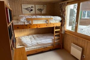 Postel nebo postele na pokoji v ubytování Chalet Arnica