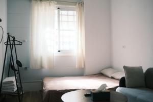 Una cama o camas en una habitación de A Forest Homestay