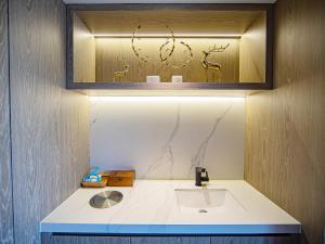 ห้องน้ำของ Xiangyang Station Minfa World City Yishang Plus Hotel