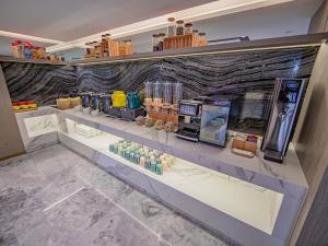 ภาพในคลังภาพของ Xiangyang Station Minfa World City Yishang Plus Hotel ในเซียงหยาง