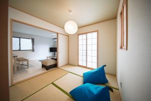 TV a/nebo společenská místnost v ubytování Inamine Terrace N