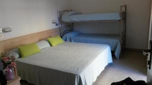Postel nebo postele na pokoji v ubytování Hotel Niagara