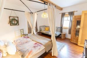 Postel nebo postele na pokoji v ubytování Haus Riedmann