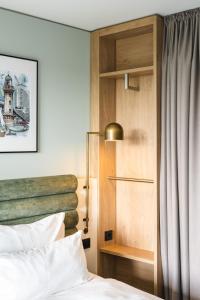 A bed or beds in a room at aja Warnemünde
