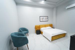 Postel nebo postele na pokoji v ubytování Crazzy Days Hotel I Sonipat