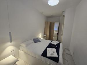 A bed or beds in a room at Appartamenti Reali Bonaccini