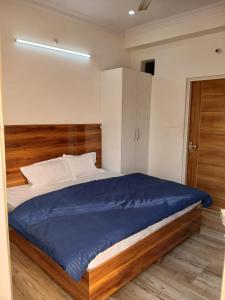 Ένα ή περισσότερα κρεβάτια σε δωμάτιο στο Jaiswal Home Stay +44 φωτογραφίες