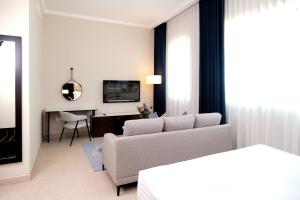 TV a/nebo společenská místnost v ubytování Jannah Executive Hotel Apartments