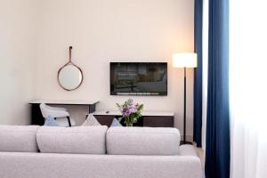 TV a/nebo společenská místnost v ubytování Jannah Executive Hotel Apartments