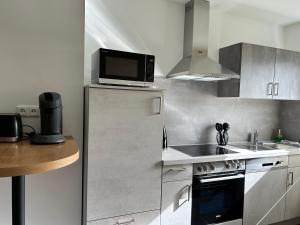 Kuchyň nebo kuchyňský kout v ubytování Fewo Monteurswohnung Badegasse