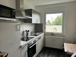 Kuchyň nebo kuchyňský kout v ubytování Fewo Monteurswohnung Badegasse