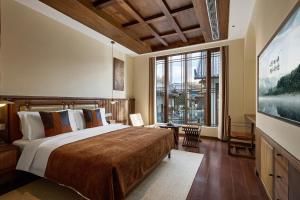 Postel nebo postele na pokoji v ubytování ARULA J Hotel + 37 fotografií