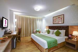 Postel nebo postele na pokoji v ubytování Hotel 91 Huda City Centre + 37 fotografií