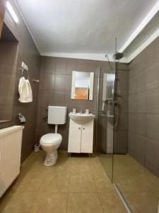 Koupelna v ubytování Liric Studio