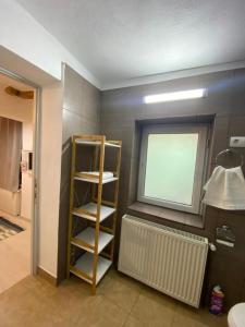 Palanda nebo palandy na pokoji v ubytování Liric Studio