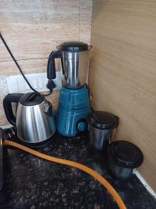 Kaffe- og tefaciliteter på Haridasa-- Devotee of Shri Krishna