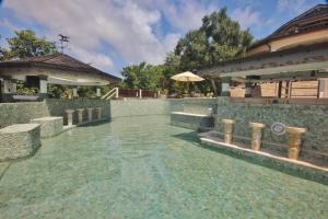 Kolam renang di atau dekat dengan Tropical Hideaway