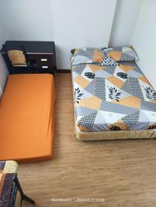 Postel nebo postele na pokoji v ubytování Mesaverte Residences + 11 fotografií