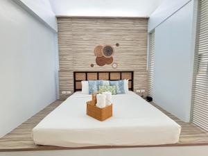 Postel nebo postele na pokoji v ubytování Arawan Beach Resort Krabi