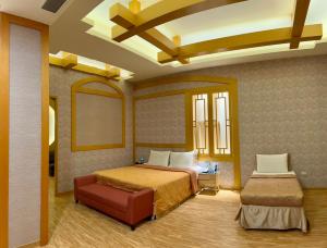 Katil atau katil-katil dalam bilik di Wei Feng Exquisite Motel Pintung Branch