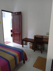 Letto o letti in una camera di Alex Home Stay