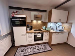 Kuchyň nebo kuchyňský kout v ubytování NEU! Ferienwohnung Hofblick