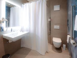 Ein Badezimmer in der Unterkunft Cubilaris Motel