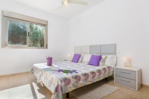 Ένα ή περισσότερα κρεβάτια σε δωμάτιο στο Can Pica Beach House by Llagosta Villas