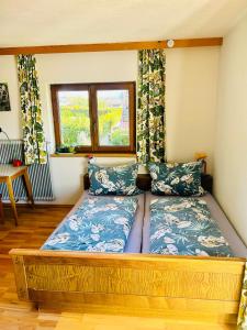 Postel nebo postele na pokoji v ubytování Haus Winkl 55