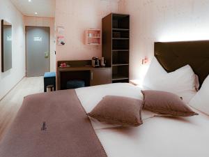 Ein Bett oder Betten in einem Zimmer der Unterkunft Cubilaris Motel