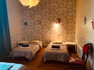 Кровать или кровати в номере " Venez DormiR Chez Nous " #Condom#Gascogne#d'Artagnan#Armagnac#Le Bonheur est dans le GERS