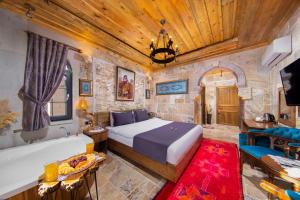 TV a/nebo společenská místnost v ubytování Cappadocia Chiaro