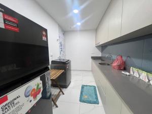 Η κουζίνα ή μικρή κουζίνα στο Di Aran Residence Penang +3 φωτογραφίες