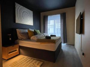 Katil atau katil-katil dalam bilik di Ancram SPA Miskolc