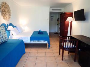 Katil atau katil-katil dalam bilik di PIERRE & VACANCES Antigua 03 +29 gambar